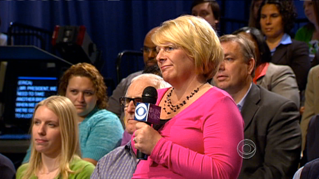 President Barack Obama visits with CBS News correspondent Harry Smith and "Early Show" co-anchor Erica Hill. during a break at a CBS News Town Hall Meeting on the economy at the Newseum in Washington, Wednesday, May 11, 2011. (AP Photo/Carolyn Kaster) 