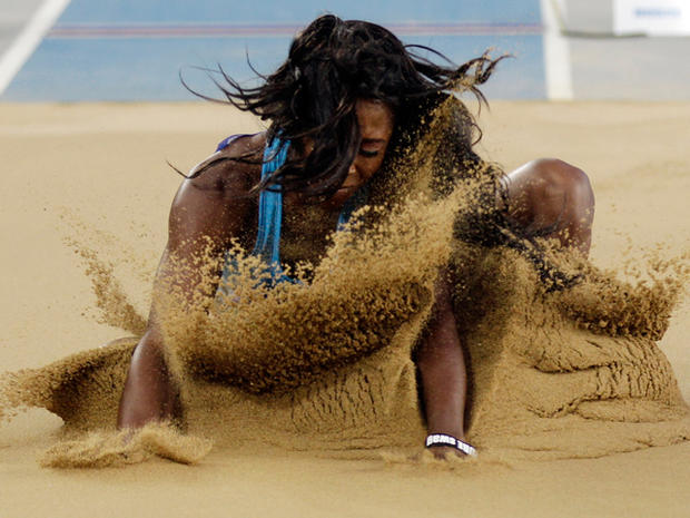 Tianna Madison competes in the women's long jump  