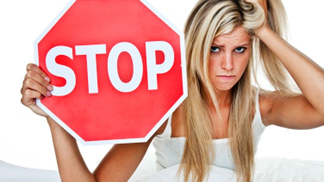 itchy, woman, blonde, in bed, stop sign, stock, 4x3 
