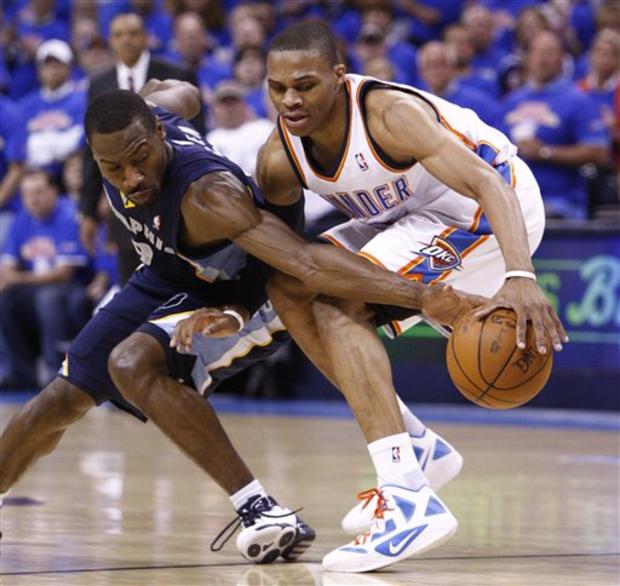 Tony Allen reaches in to knock the ball away from Russell Westbrook 
