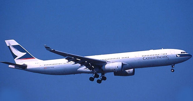 Engine fire forces Cathay Pacific flight down - CBS News