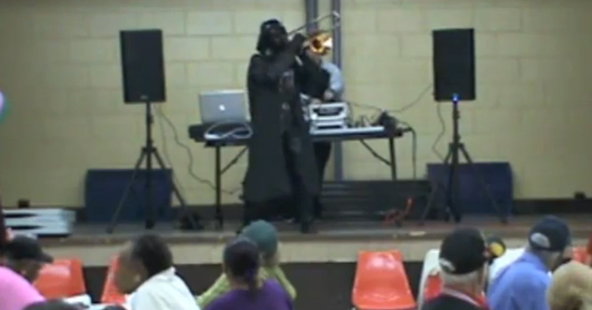 Darth Vader playing a trombone and salsa dancing - CBS News