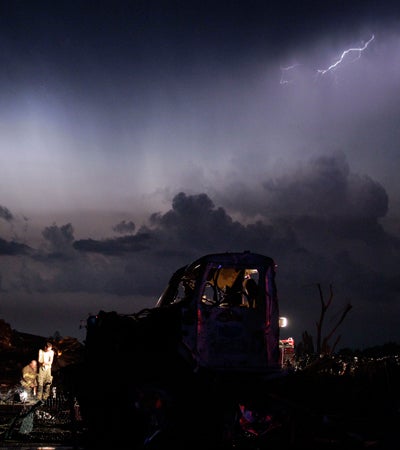 workers wait for a medical team 