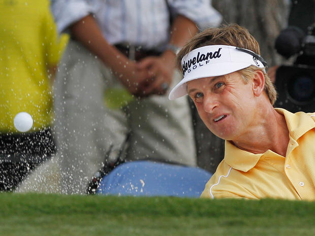 David Toms hits out of the sand  
