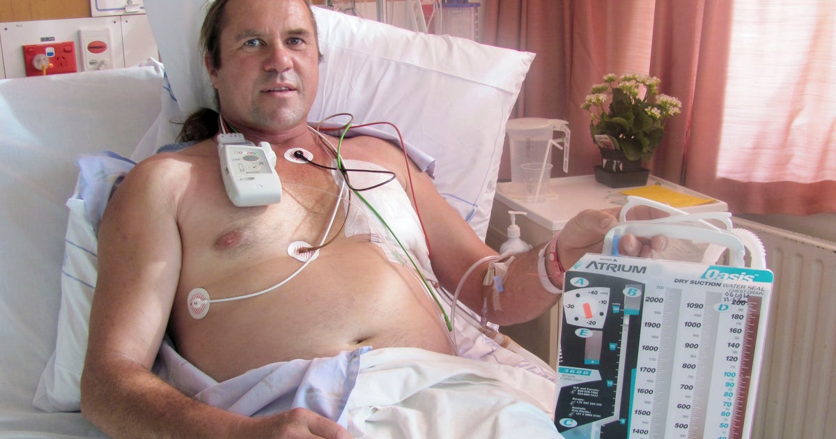 Compressed air turns trucker into human balloon - CBS News