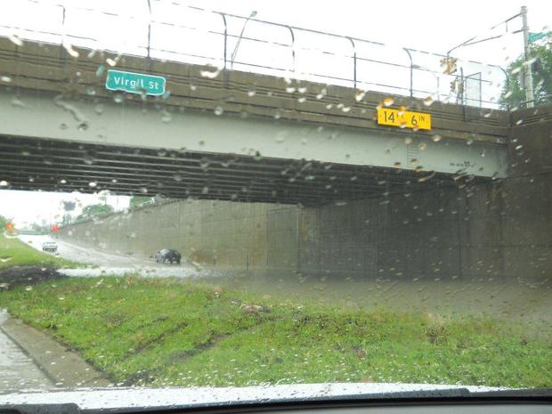 at-least-a-foot-of-floodwater-blocked-i-96-exit-ramp-to-telegraph-rd-5-25-11.jpg 