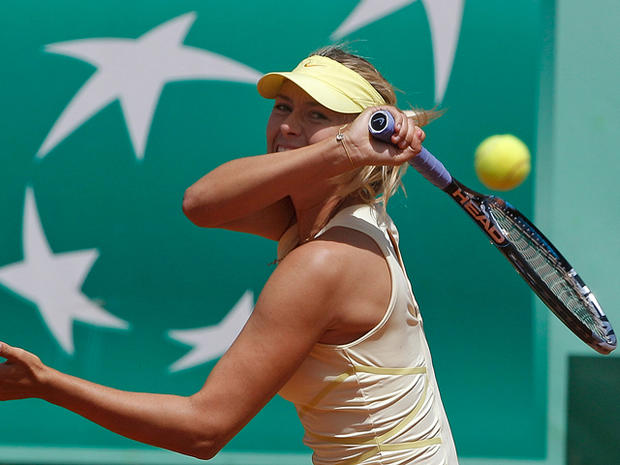 Maria Sharapova returns the ball 