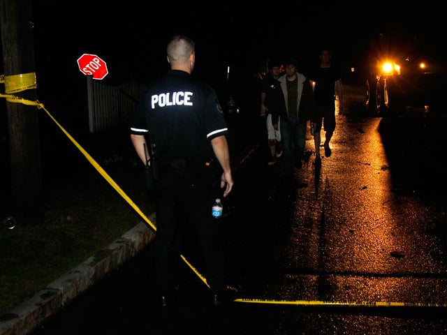 police officer stops vehicles 