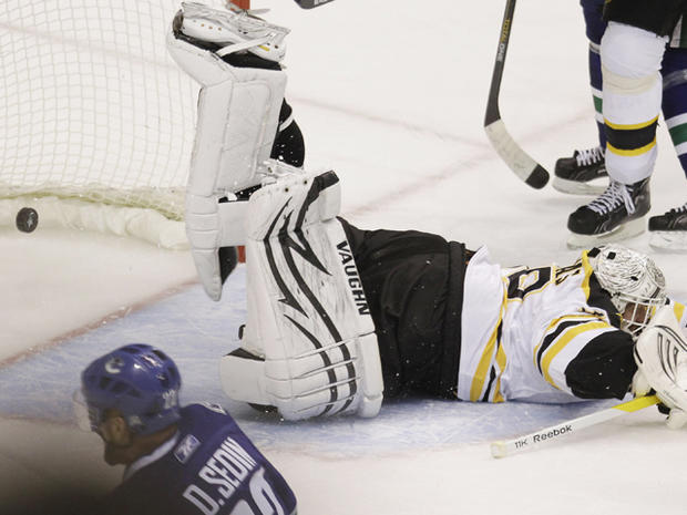 Boston Bruins goalie Tim Thomas Boston Bruins goalie Tim Thomas slips past for a goal 