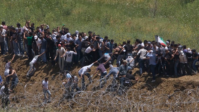 Pro Palestinian activists mass at Syria-Israel border 