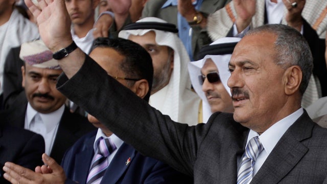 Wounded Saleh leaves Yemen, urged to step down  