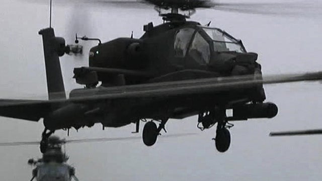 Apache_helicopter_tAP110604121860.jpg 