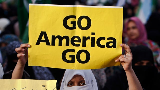 A woman supporter of the Pakistani religious party  