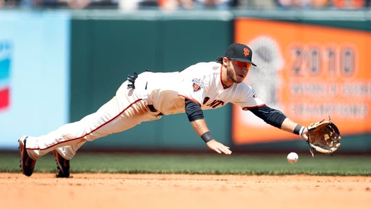 Brandon Crawford makes a diving stop 