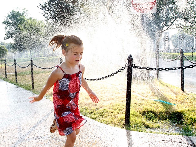 Allie Marsinko cools off from the simmering heat  