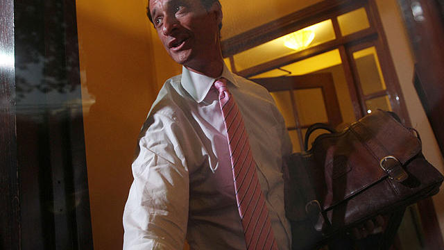 Rep. Anthony Weiner, D-N.Y., closes the front door of his building on reporters as he arrives at his house in the Queens borough of New York, Thursday, June 9, 2011.  