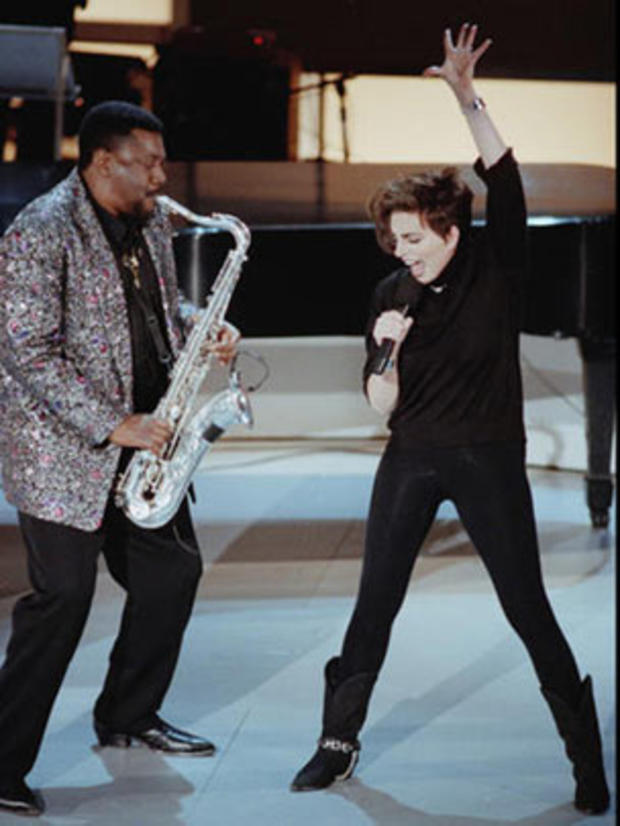 Liza Minnelli performs with saxophonist Clarence Clemons during taping of television special in 1989. 