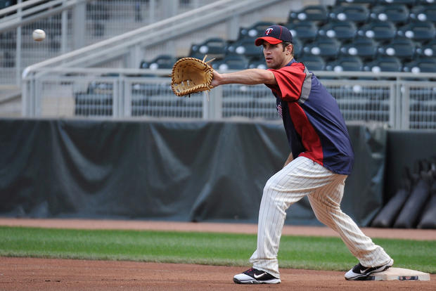 Joe Mauer Practices At First Base 