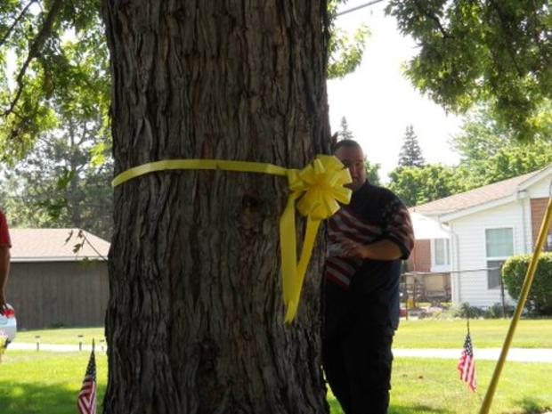 a-yellow-ribbon-circles-a-next-door-neighbors-tree-in-flat-rock.jpg 