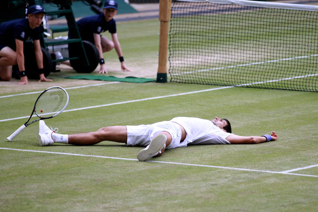 Novak Djokovic celebrates championship point  