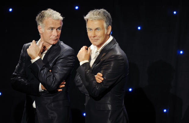 french-humorist-and-actor-franck-dubosc-l-poses-next-to-his-wax-likeness-at-the-grevin-wax-by-afp.jpg 