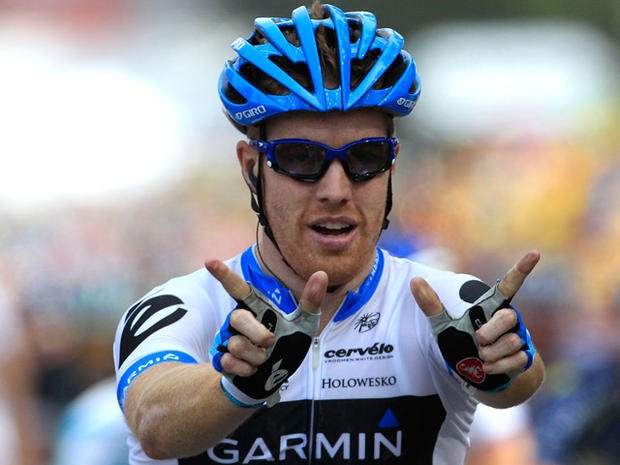Tyler Farrar of the U.S. forms "W'' at finish line as he wins third stage of the Tour de France 