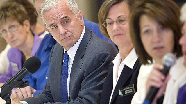 Minnesota Governor Mark Dayton listens to members of the public explain how state budget cuts would affect them at a roundtable discussion July 13, 2011 at the Rochester, Minn. Senior Citizen Center.  