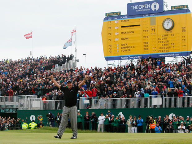 Darren Clarke reacts on the 18th green 