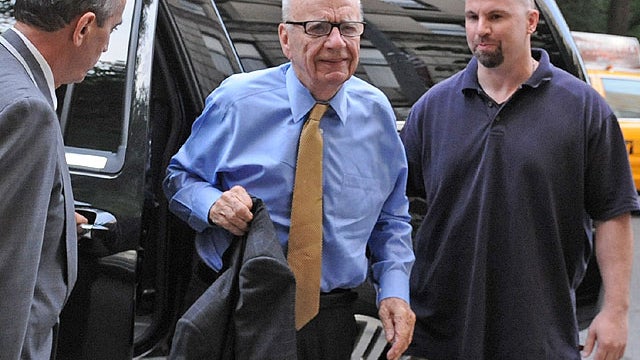 News Corporation head Rupert Murdoch arrives at his Fifth Avenue residence, Wednesday, July 20, 2011, in New York. 