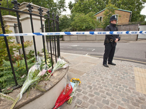 A policeman stands next to a police cordon near the home of British singer Amy Winehouse in Camden Square, London, following her death on July 23, 2011.  