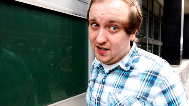 Jonathan May-Bowles leaves Westminster Magistrates' Court in London July 29, 2011. May-Bowles was convicted of assault and causing harassment by throwing a plate of shaving foam at media tycoon Rupert Murdoch as he gave testimony to a British Parliament s 