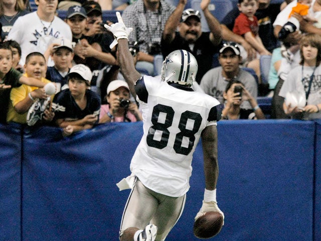 Dez Bryant celebrates with fans  