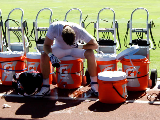Jesse Nading sits on a cooler after a workout 