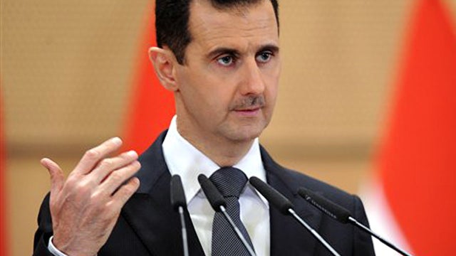 Syrian President Bashar Assad delivers a speech in Damascus, Syria, at Damascus University in this June 20, 2011, photo released by the Syrian official news agency SANA. 