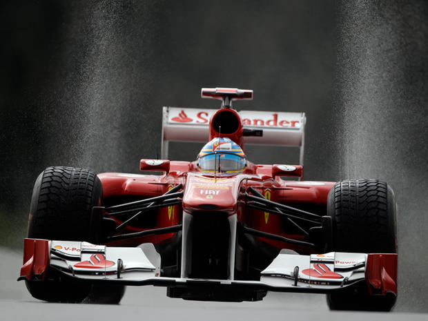 Fernando Alonso steers his car during the free practice 