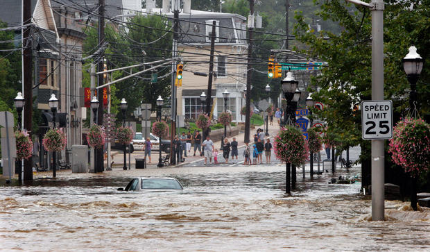 A car sits submerged on Main Street in Hightstown, N.J. on Aug. 28, 2011 after Peddie Lake overflowed from Hurricane Irene. 