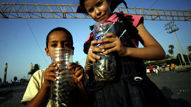 Libyan children show their collection of spent bullet casings gathered from Martyrs' Square, formerly known as Green Square, in the capital city of Tripoli Aug. 27, 2011. Libyan rebels embarked on the job of getting the capital up and running again as a g 