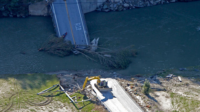 A bridge on Route 73 lies in the river in this aerial view on Tuesday, Aug. 30, 2011 in Rochester, Vt. 