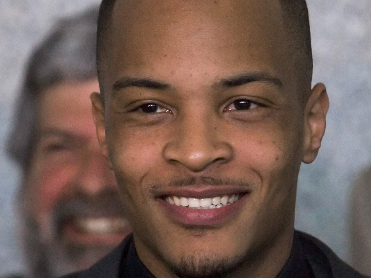 Rapper T.I. released from prison 1 month early - CBS News