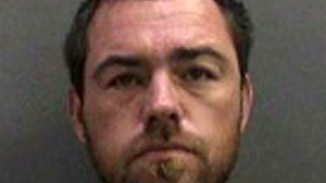 In this booking photo released by the Orange County Sheriff's Dept. on Aug. 29, 2011 showing Sloan Briles, 35 who was arrested Aug. 28, 2011 for investigation of child endangerment and resisting arrest.  