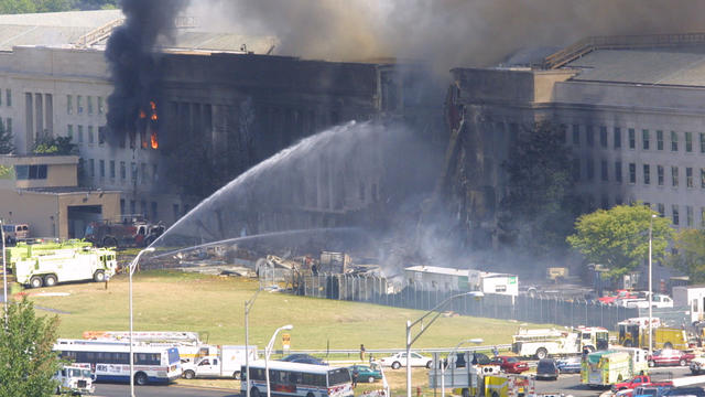 Smoke comes out from the west wing of the Pentagon building September 11, 2001 in Arlington, Va. 