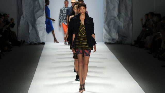 Models walk the runway at the Richard Chai Spring 2012 fashion show at The Stage at Lincoln Center on Sept. 8, 2011, in New York. 