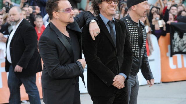 "'From The Sky Down" director  Davis  Guggenheim, center,  is flanked  by U2's  Bono, left, and  The  Edge at the 2011 Toronto International Film Festival on Sept. 8, 2011.   
