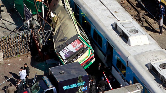 A crash between two passenger trains and a bus is seen in Buenos Aires, Argentina, Sept. 13, 2011. 
