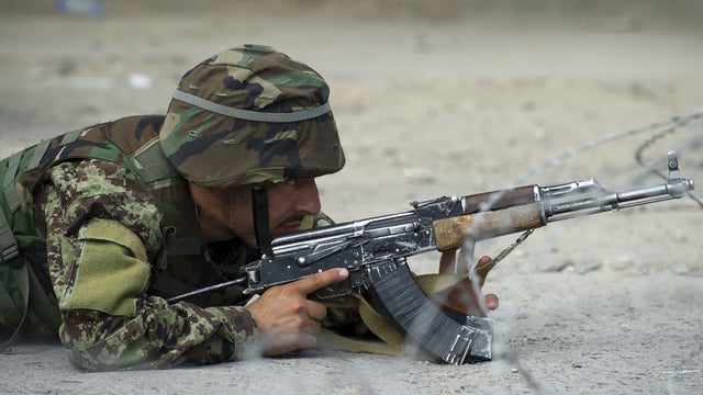 Afghan soldier poised during an insurgent attack on Kabul 