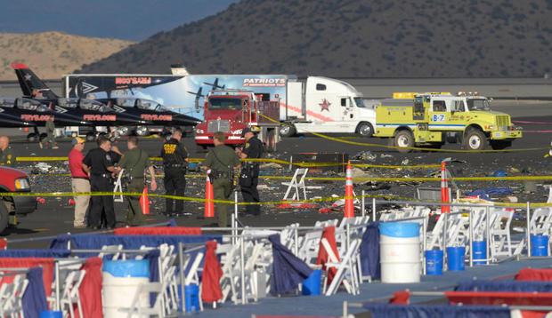 Debris from the plane that crashed at the Reno Air Races is scattered in front of the grandstand at the Stead Airport on Sept. 16, 2011 in Reno, Nev.  