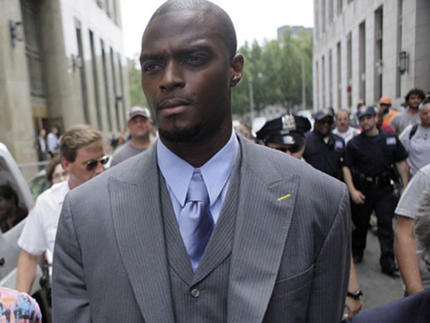 Former New York Giants wide receiver Plaxico Burress leaves Manhattan Criminal Court after he testified to a Grand Jury, Wednesday, July 29, 2009 in New York. 