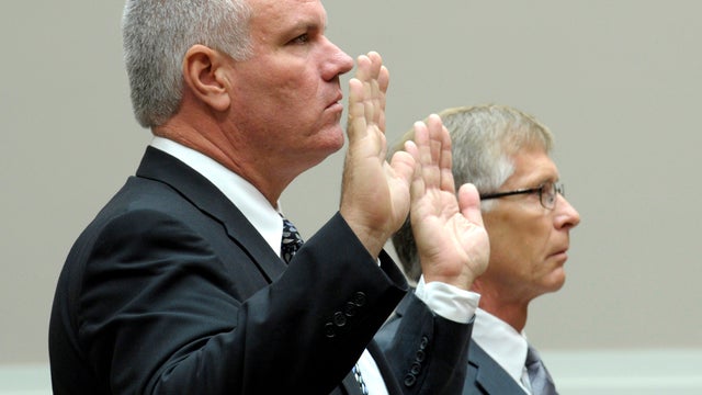 Solyndra CEO Brian Harrison, left, and Chief Financial Officer Bill Stover are sworn in on Capitol Hill in Washington Sept. 23, 2011, prior to testifying before a House Oversight and Investigations subcommittee. 