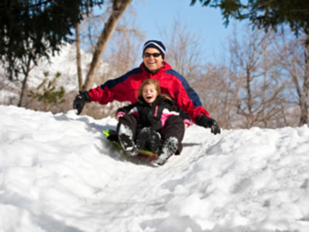 12/23/11 - A Guide To Twin Cities' Sledding Hills - father and daughter on sled 