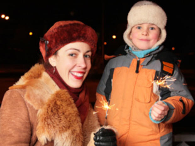 12/30/11 - : A Guide to New Year's Eve Events and Activities for the Whole Family – Mother &amp; Son with sparklers 